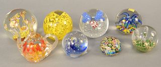 Group of eight paperweights to include Millefiori, etc. tallest ht. 4 in. Provenance: The Estate of Ed Brenner, Short Hills N.J.