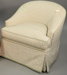 Custom upholstered club chair with upholstered ottoman. ht. 29 in., wd. 28 1/2 in. Provenance: Estate of William and Teresa Patton, Lake Ave Greenwich