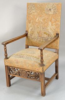Continental style armchair with needle work and petit point upholstery depicting queen, guardian horses, animals, and garden. ht. 46 1/2 in., wd. 26 i