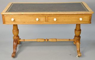Pine leather top table with two drawers. ht. 27 1/2 in., top: 23 1/2" x 48". Provenance: Former home of Mel Gibson, Old Mill Rd, Greenwich, CT