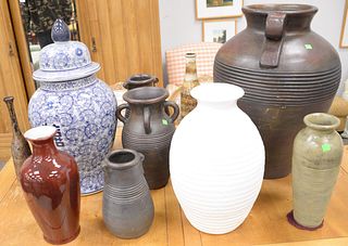 Group of fourteen pieces to include ceramic, pottery and metal vases and pots. tallest 24 1/2 in.