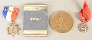 Four piece lot to include 1936 Tiffany and Company calendar book, two Tiffany and Company silver medals and bronze Sons of American Revolution medal.