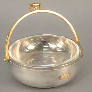 Gucci stainless and silver plate bowl having brass swing handle glass bowl insert, marked in brass Gucci, with leather bottom marked made in Italy in 