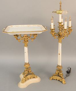 Pair of French bronze candelabras, one made into small table slightly shorter than the other, each resting on triple winged figural base. total ht. 24