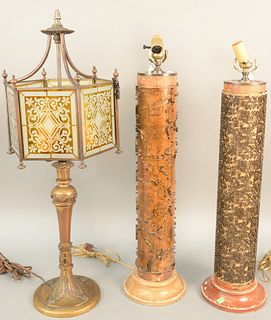 Three piece lot to include two wallpaper rolls made into table lamps both wood with metal design along with metal and stained glass lamp. ht. 30 in. P