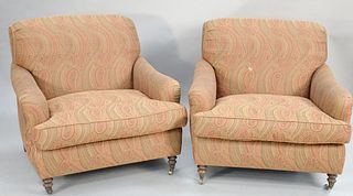 Pair of custom upholstered easy chairs. ht. 36 in., wd. 38 in. Provenance: Former home of Mel Gibson, Old Mill Rd, Greenwich, CT