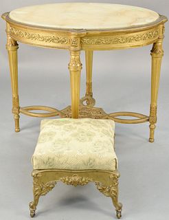 Two piece lot to include Louis XVI style oval table gilt with metal mounts, onyx top and iron stool. ht. 27 in., top: 25 1/2" x 35".