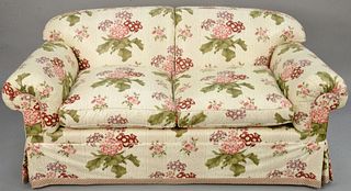 Custom upholstered loveseat with two cushions, attributed to Thoma De Angelis N.Y. possibly Chintz upholstery. lg: 64 in., ht. 30 in. Provenance: Esta