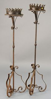 Pair of large iron floor candle prickets, crown form gallery on top. ht. 55 in. Provenance: Former home of Mel Gibson, Old Mill Rd, Greenwich, CT