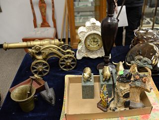 Group lot to include heavy brass dragon canon, cat door stop, two iron basket flowers, two pairs of book ends, bull and bear, Maitland Smith urn and a