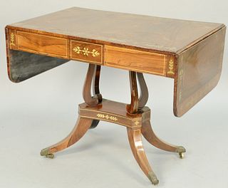 Regency Brass Inlaid Mahogany Sofa Table, one side with three short drawers on a four leg pedestal support, early 19th century (small part of brass