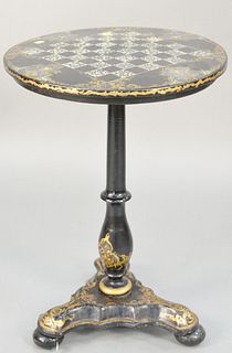 Paper mache Victorian games table with Mother of Pearl inlay. ht. 27 in. dia. 20 in. Provenance: The Estate of Ed Brenner, Short Hills N.J.