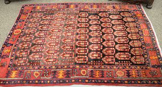 Oriental throw rug. 4' 9" x 6' 9".