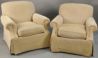 Pair of Kravet furniture upholstered chairs and ottomans (some staining).ht. 34 in., wd. 35 in. Provenance: Former home of Mel Gibson, Old Mill Rd, Gr