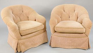 Pair of custom upholstered swivel chairs. ht. 31 1/2 in., wd. 34 in. Provenance: Estate of William and Teresa Patton, Lake Ave Greenwich, CT