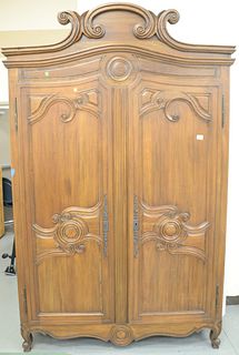 Louis XV style two door cabinet with shelved interior. ht. 95 in., wd. 60 in., dp. 25 in. Provenance: Former home of Mel Gibson, Old Mill Rd, Greenwic