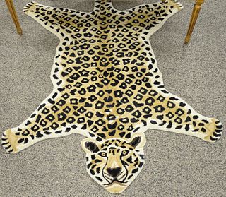 Decorative leopard style animal rug. 4' x 6'. Provenance: Estate of William and Teresa Patton, Lake Ave Greenwich, CT
