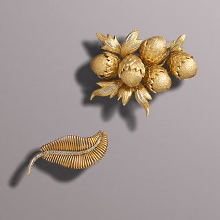 Two gold foliate brooches