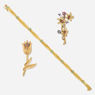 Two gem-set flower brooches and bracelet