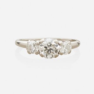 Three stone diamond engagement ring