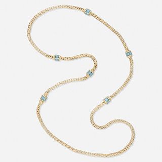 Yellow gold and blue topaz link necklace