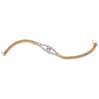 WRISTBAND WITH SIMULANTS. 14K YELLOW AND WHITE GOLD