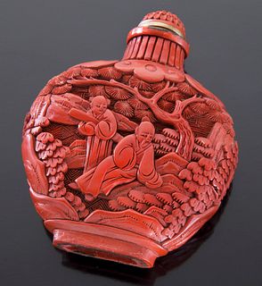 Chinese Qing carved cinnabar snuff bottle,