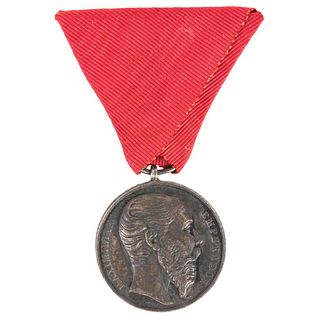 Navalón, G. Medal of Military Merit. Silver, 0.01" (32 mm). Given by the Emperor Maximilian. Ribbon in red silk.