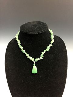 Chinese jade necklace with pendant.