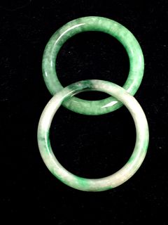 Two small Chinese jadeite bangles.