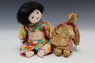 Two antique dolls.