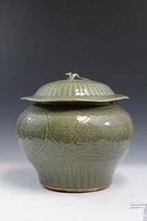 Chinese celadon porcelain jar with lid. 