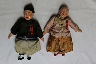Two antique Chinese dolls.