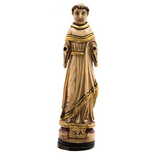 St. Anthony. Europe. 19th Century. Ivory carving with ink on wooden base with the initals "S A".