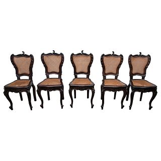 Lot of Five Chairs. 20th Century. Carved wood and bejuco. Pieces: 5.