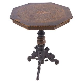 Auxiliary Table. France. 20th Century. Veneered and ebonized wood. With octagonal surface and details in geometric marquetry.
