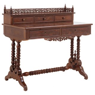 Desk.Ca. 1900. Veneered mahogany. Three upper drawers. Main surface with two drawers.