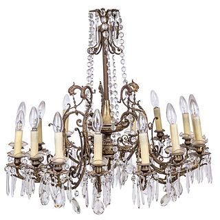 Chandelier. France. Ca. 1900. MARIE THERESE Style. In golden metal with glass prisms.