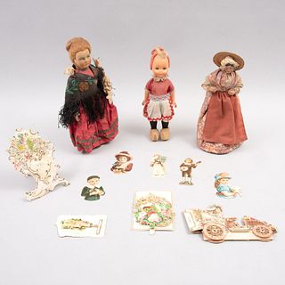 Lote de muñecas y tarjetas de felicitaciones. SXIX al inicios del XX. Holanda, Francia y otro. Muñecas en madera, otros. Piezas: 8.