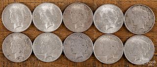 Ten silver Peace dollars, 1922-1924, various grades.