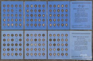 Two partial sets of Barber dimes, 1892-1916, in two collection books, one containing fifty-one pieces
