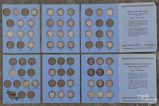 Partial set of Barber half dollars, 1892-1915, in two collection books, forty-six total pieces