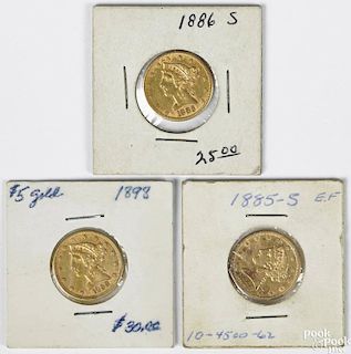 Three five dollar gold coins, to include an 1885 S, an 1886 S, and an 1898, VF-XF.