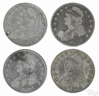 Four Cap Bust silver half dollars, 1824, VG, one with a hole, another with plugged hole.