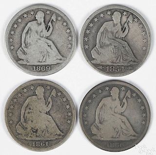 Four Seated Liberty half dollars, to include an 1854, G, an 1860 S, G, an 1861 S, G, and an 1869 S,