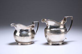 TWO GEORGIAN SILVER CREAM JUGS, the first London 1807, the second with indi