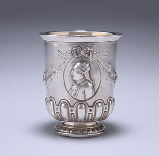 A FRENCH SILVER BEAKER, REPOUSSE WITH PROFILE PORTRAITS OF LOUIS XVI AND MA