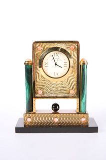 A MALACHITE AND CORAL-MOUNTED SILVER GILT TABLE CLOCK, IN THE FABERGE TASTE