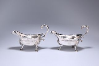 A PAIR OF GEORGE III SILVER SAUCE BOATS, CHARLES HOUGHAM, LONDON 1786, each