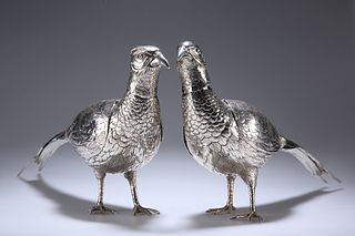 A LARGE MATCHED PAIR OF EDWARDIAN SILVER TABLE PHEASANTS, one with import m